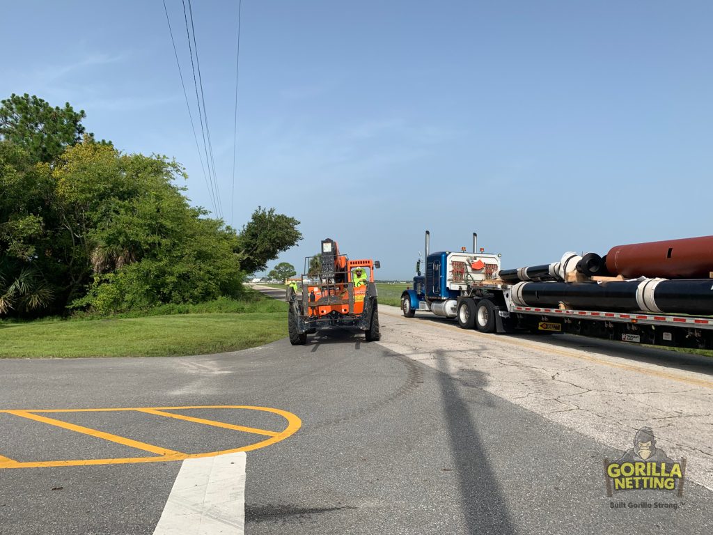 Poles & Caissons Being Delivered for the Netted Drone Enclosure Install at Embry-Riddle