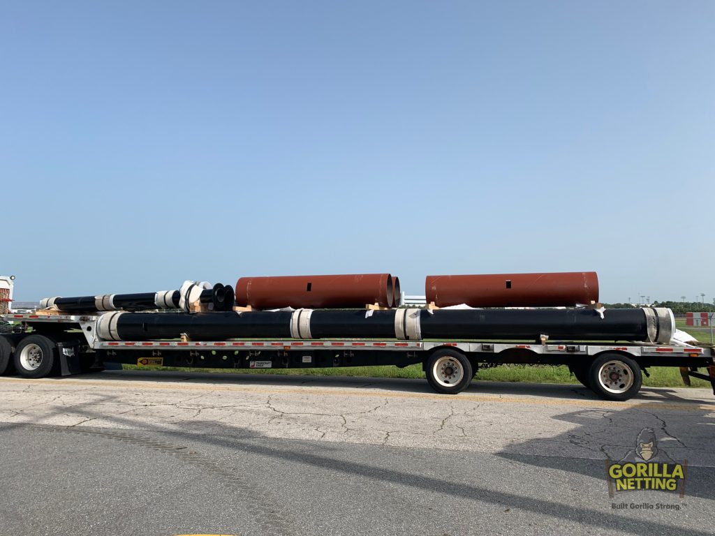 Poles & Caissons Being Delivered for the Netted Drone Enclosure Install at Embry-Riddle